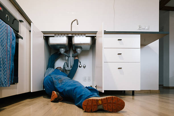 Professional Emergency Plumber technician working in Aurora, MN